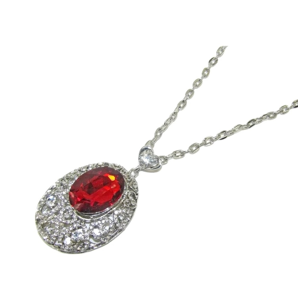 Large Sparkling Red Oval Crystal Pendant Encased in Clear Crystal Hearts